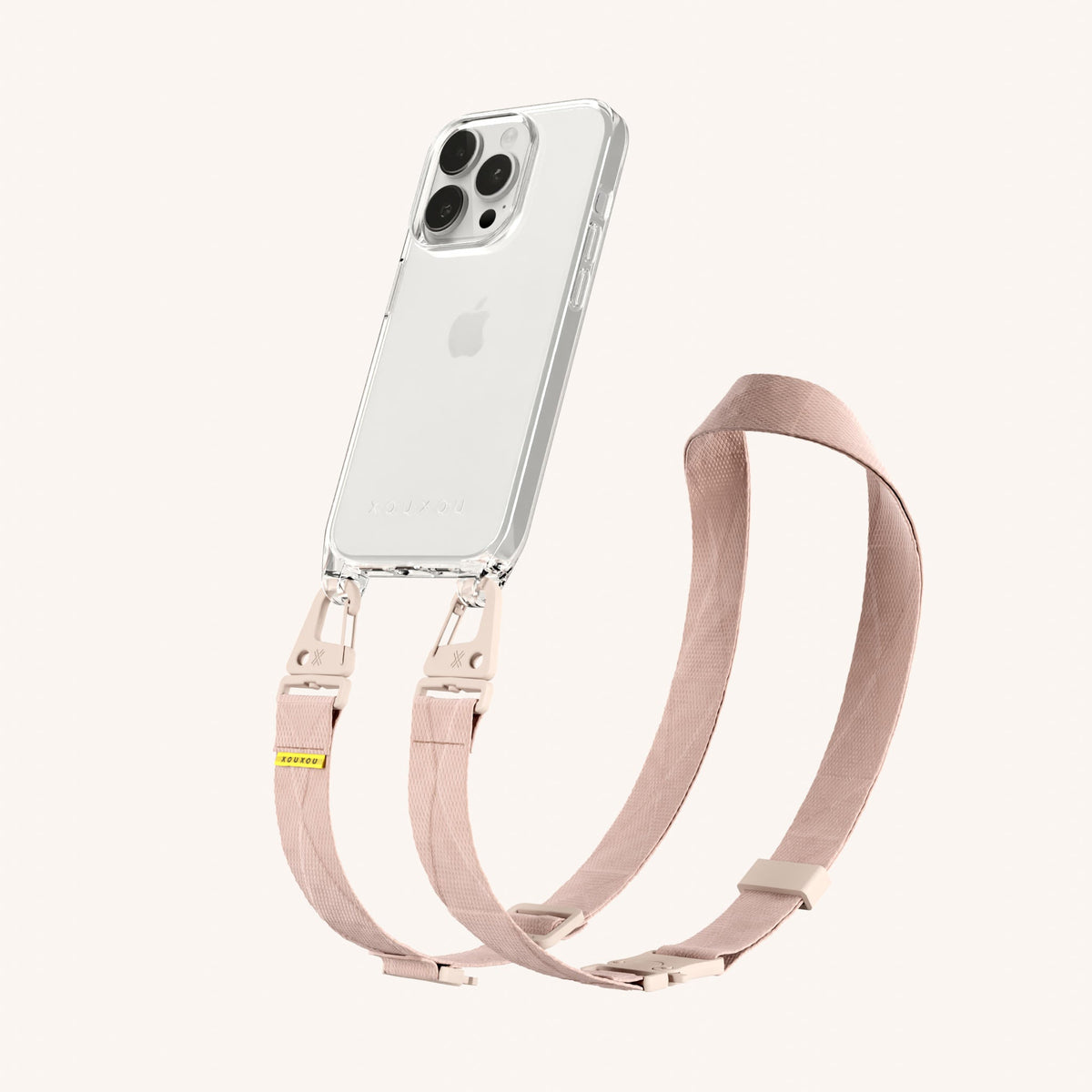 Clear Phone Necklace with Lanyard for iPhone 15 Pro without MagSafe in Clear + Powder Pink Perspective View | XOUXOU #phone model_iphone 15 pro