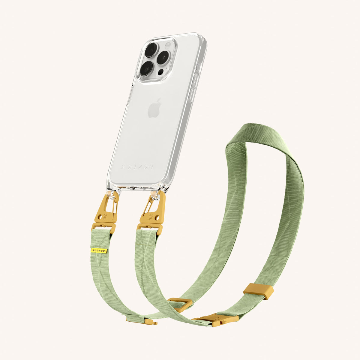 Clear Phone Necklace with Lanyard for iPhone 15 Pro without MagSafe in Clear + Light Olive Perspective View | XOUXOU #phone model_iphone 15 pro