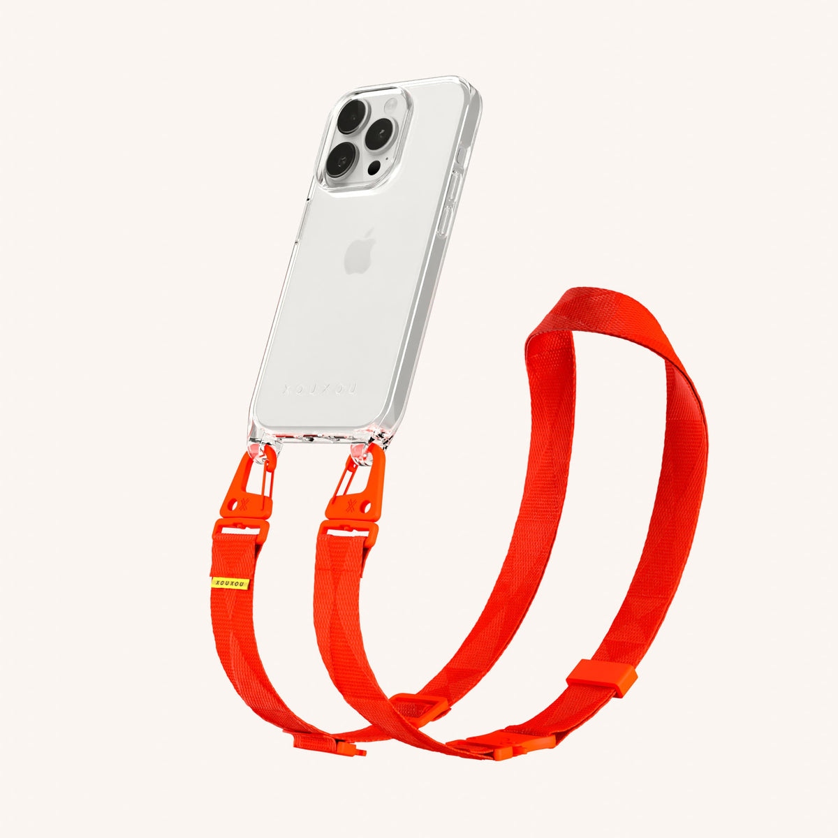 Clear Phone Necklace with Lanyard for iPhone 15 Pro without MagSafe in Clear + Neon Orange Perspective View | XOUXOU #phone model_iphone 15 pro