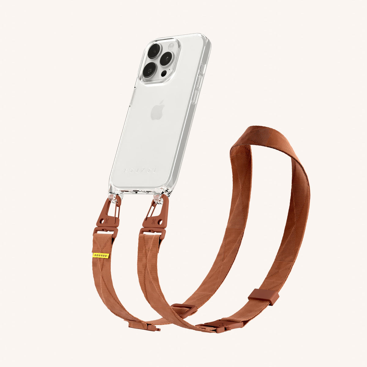 Clear Phone Necklace with Lanyard for iPhone 15 Pro without MagSafe in Clear + Rusty Red Perspective View | XOUXOU #phone model_iphone 15 pro